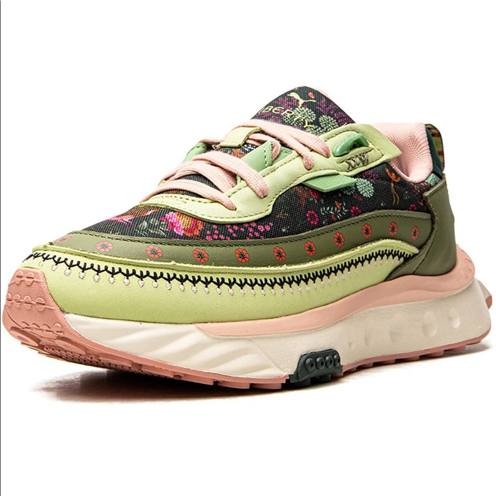 Women’s Puma Liberty sneaker. Never worn, in box.